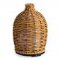 The Wicker Vase Medium Diffuser has a matte wicker that is tightly woven into a beautiful sleeve, giving off a subtle glow when in use. This diffuser brings a natural warmth to your space with organic, earthy textures and neutral tones.