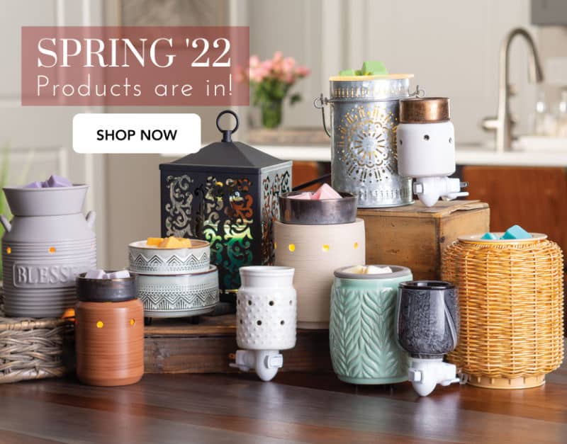 Spring '22 Products are In! Shop Now. Eleven Candlewarmers products on a table, including Blessed Illumination Fragrance Warmer, Galvanized Tin Illumination Fragrance Warmer, Mint Leaf Flip Dish Wax Warmer, Farmhouse Illumination Fragrance Warmer, Iron and Clay Illumination Fragrance Warmer, Pewter Walnut Midsize Illumination Fragrance Warmer, Venetian Pluggable Fragrance Warmer, Wicker Lantern Illumination Fragrance Warmer, Santa Fe 2-In-1 Classic Fragrance Warmer, Obsidian Pluggable Fragrance Warmer, and Black Cottage Lantern