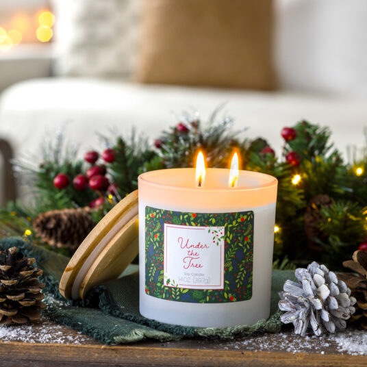 UNDER THE TREE SOY CANDLE: The nostalgic scent of a fresh cut pine tree ready to be wrapped with lights and ornaments.