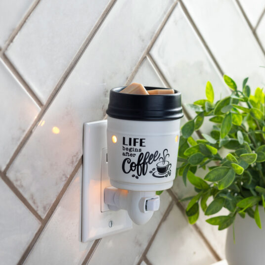 Life Begins After Coffee! The Coffee Pluggable Fragrance Warmer will bring a delightful ambiance to any home. With an elegant black and white design, this warmer can be used in both vertical and horizontal outlets by twisting the plugin base, making them ideal for above counter outlets in small rooms or spaces. It's the safest way to use fragrance in your home.