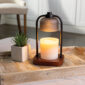 Create a relaxing ambiance in any room with the Black Pendant Candle Warmer Lamp. It is accented with a frosted glass shade perched above a candle, and casts a soft light throughout your home. This stunning piece is the perfect way to create a warm atmosphere in any room in your house.
