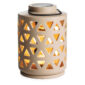 The Geo Canopy Illumination Warmer is a decorative, stylish, and simple warmer that will complement your home décor. This top-down wax warmer features a metal handle and a halogen light bulb for melting fragranced wax melts. It has an elegant circular shape with a geometric pattern that adds interest to any room.