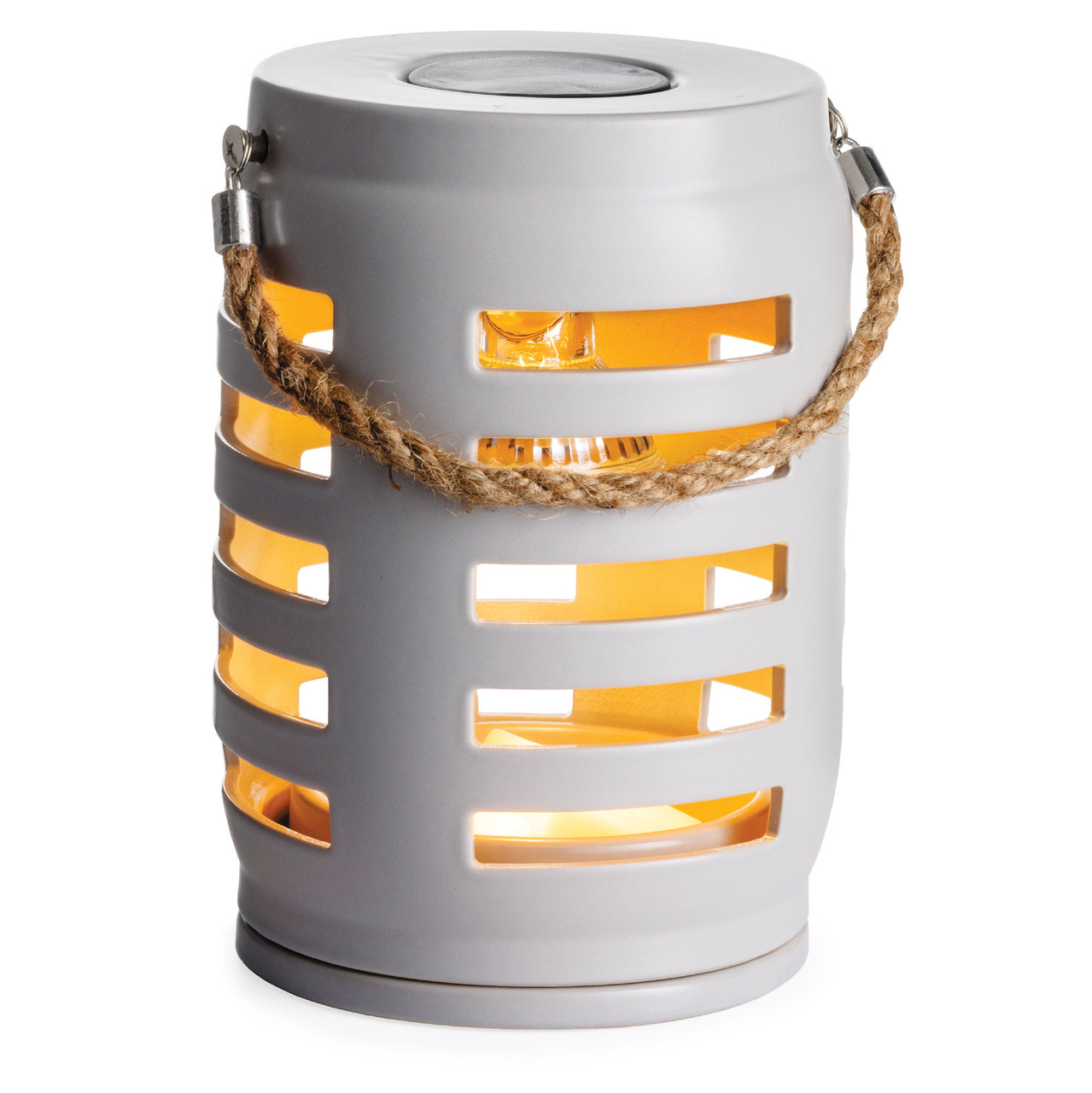 Add beautiful fragrance to your room with the Shutter Lantern Canopy Illumination Warmer. The stunning lantern features a shutter motif and rustic rope handle. A halogen bulb warms wax melts in the warming dish from the top down releasing fragrance into your home.