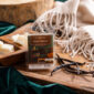 Let the enchanting dance of our Velvet Vanilla Woods Wax Melt whisk you away to a cozy haven, where delightful vanilla, warm caramel and kind musk embrace you. The lingering notes of woody cedar complete this indulgent fragrance, creating a truly captivating experience for your senses. Transform any space into a tranquil sanctuary with our Velvet Vanilla Woods Wax Melt. Don't miss out on this irresistible blend!