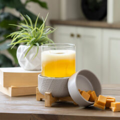 DESIGN: Enjoy the simple yet stunning functionality of the Wooden Pedestal 2-in-1 Fragrance Warmer with a low-key design. The curved wooden stand and grey ceramic finish will transform your living space into a relaxing oasis with the aroma of your favorite candles or wax melts.
FEATURES: Removable dish for use with your favorite fragrance wax melts, bricks or tarts. Easy on/off dial on cord and an indicator light so you know when it is on.
USE: For use with candles that are 10 oz or smaller or wax fragrance melts or wax tarts.
SPECS: Warming plate is 3.9