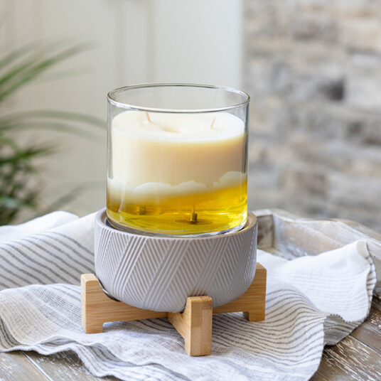 DESIGN: Enjoy the simple yet stunning functionality of the Wooden Pedestal 2-in-1 Fragrance Warmer with a low-key design. The curved wooden stand and grey ceramic finish will transform your living space into a relaxing oasis with the aroma of your favorite candles or wax melts.
FEATURES: Removable dish for use with your favorite fragrance wax melts, bricks or tarts. Easy on/off dial on cord and an indicator light so you know when it is on.
USE: For use with candles that are 10 oz or smaller or wax fragrance melts or wax tarts.
SPECS: Warming plate is 3.9