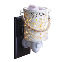 Create a rustic ambiance in any room with the Lone Star Pluggable Fragrance Warmer. The light from the interior of the warmer creates a beautiful stargazing effect that dances across the walls and ceiling. It's perfect for filling your home with a lovely fragrance and bringing a vintage or farmhouse vibe to your decor. The removable dish makes switching wax melts a breeze, so you can change your scents with the season.