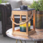 DESIGN: Give your home decor a handcrafted touch with this chestnut colored Wood & Rope Candle Warmer Lantern. The unique design of this lantern candle warmer lets you experience the cozy glow of your favorite scented candle, safely warmed from inside the lantern.
FEATURES: Our Top-down warming technology provides the look and fragrance of a lit candle without the flame. NP5 bulb, included, can be replaced when it wears out.
USE: Accommodates most jar candles 22 oz or smaller and up to 6