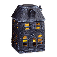 Calling all Halloween lovers, it's time to get spooky. This Haunted Mansion Canopy Fragrance Warmer will become a staple of your home's seasonal decorating for years to come. Made of porcelain with an eerie touch, the boarded-up windows cast soft light and the allure of mystery within the walls. Enchant your home with your favorite autumn scents and set the mood with ghostly lighting as wax melts are warmed and illuminated from within.