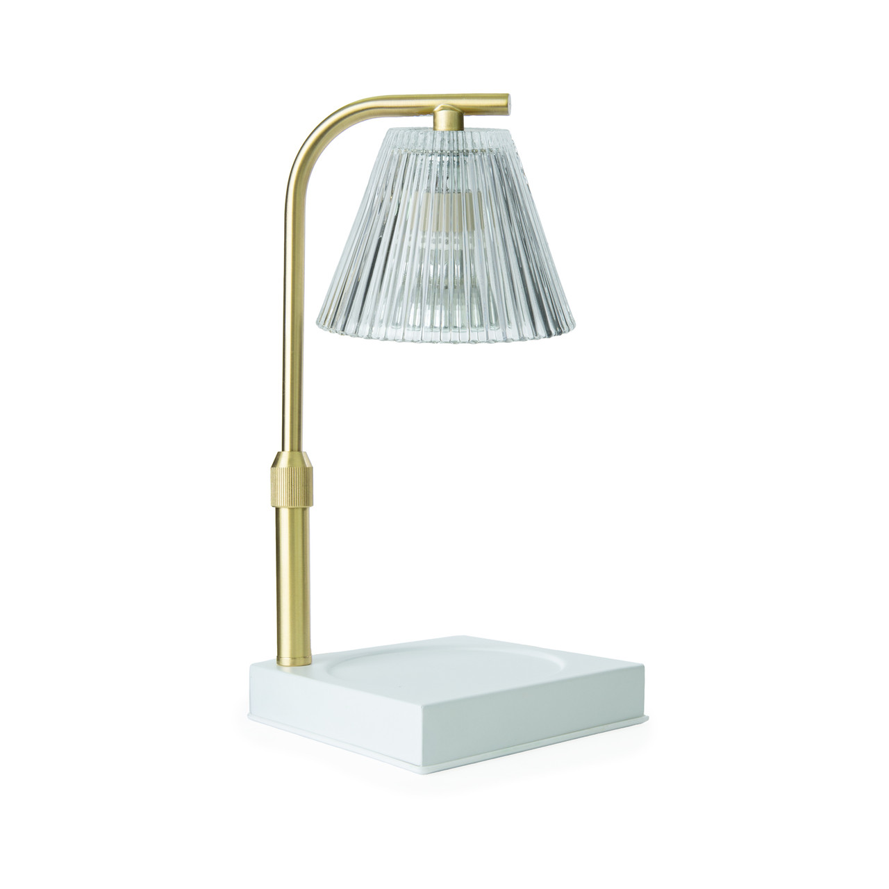 Add a touch of elegance to your home with our Gold Luna Candle Warmer Lamp. The clear glass shade allows light and warmth to shine through freely, while the glass flutes create a beautiful decorative effect. Our candle warmer lamps use top-down warming technology that lets you enjoy the scent and ambiance of a candle without a flame. Features an adustable stem and timer/dimmer switch.