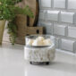 The Classic 2-in-1 Swirl Glass Fragrance Warmer showcases a beautiful swirl pattern that captures and reflects light, adding a dynamic and stylish element to your decor. The high-quality glass construction ensures durability and timeless appeal.