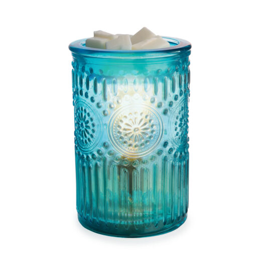 Elevate your home decor with the Vintage Parisian Glass Fragrance Warmer. This exquisite piece combines the timeless beauty of embossed tinted glass with the functionality of a fragrance warmer, making it a standout addition to any room. Featuring intricate floral motifs surrounded by delicate beading, this fragrance warmer is designed to provide both textural and visual appeal, creating a sophisticated and inviting atmosphere.
