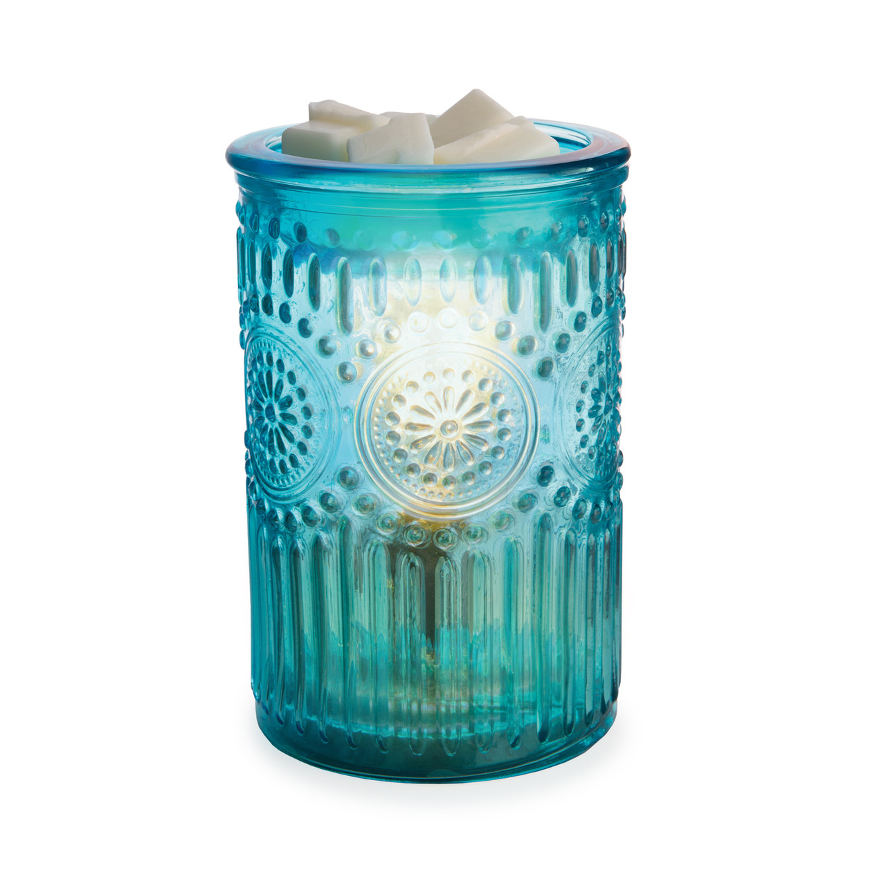 Elevate your home decor with the Vintage Parisian Glass Fragrance Warmer. This exquisite piece combines the timeless beauty of embossed tinted glass with the functionality of a fragrance warmer, making it a standout addition to any room. Featuring intricate floral motifs surrounded by delicate beading, this fragrance warmer is designed to provide both textural and visual appeal, creating a sophisticated and inviting atmosphere.