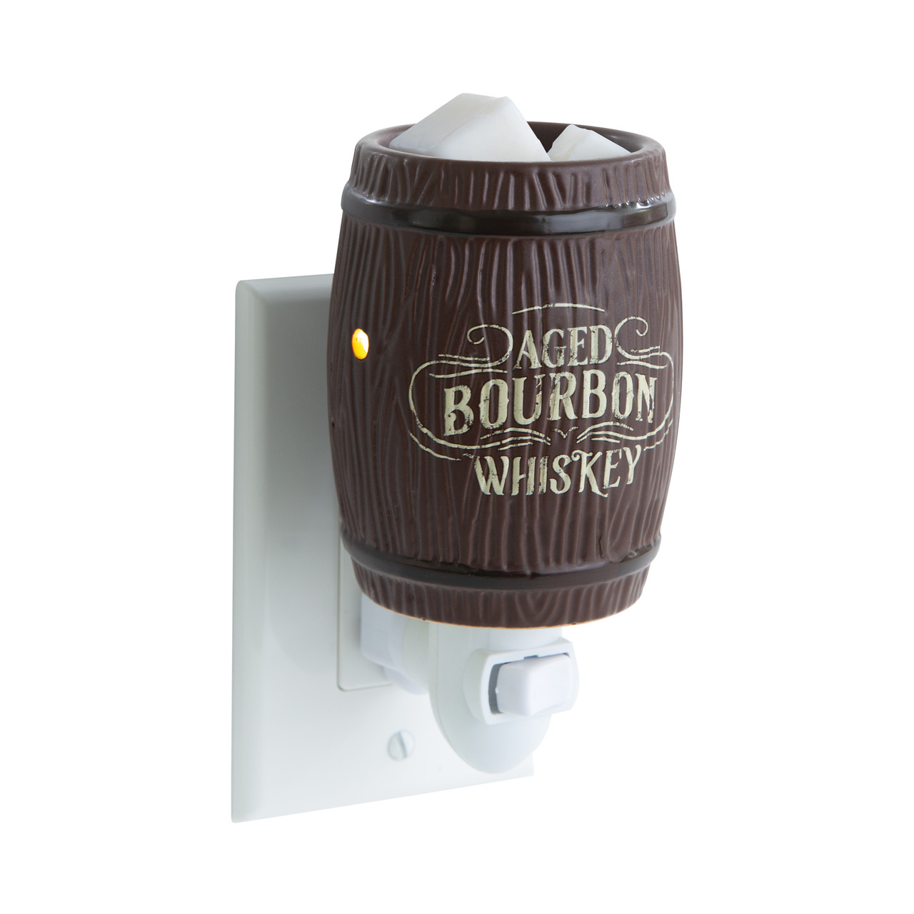 Elevate your home’s ambiance with the Pluggable Bourbon Barrel Fragrance Warmer. This distinctive piece combines vintage western style with modern functionality, making it a standout addition to any room. Expertly crafted to resemble a traditional wooden bourbon barrel, this pluggable fragrance warmer boasts intricate details and a realistic wood grain finish. The 