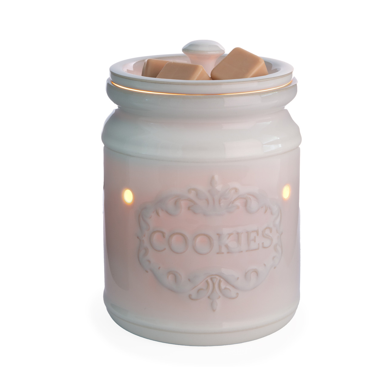 Bring the warmth of home baking to your space with our Classic Cookie Jar Fragrance Warmer. Inspired by the timeless charm of beloved home cookie jars, this white porcelain fragrance warmer combines nostalgic elegance with modern functionality, making it a perfect addition to any space. Crafted with meticulous attention to detail, this fragrance warmer features the word 