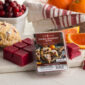 Indulge in the cozy scent of Orange Cranberry Scone, where tart cranberries and sweet orange zest blend with buttery scone, brown sugar, and a hint of holiday spice. This warm, bakery-inspired fragrance fills your space with the inviting charm of festive treats and holiday baking. TOP NOTES: Bakery, Sugar MID NOTES: Cranberry, Citrus BASE NOTES: Butter, Vanilla