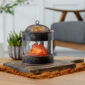The Fire Pit Wax Warmer brings the cozy ambiance of a crackling fire into your home. The design mimics a rustic fire pit, featuring a mesh lid and the comforting glow of smoldering embers. Enjoy the essence of the outdoors year-round while filling your space with your favorite scents.