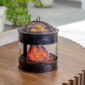 The Fire Pit Wax Warmer brings the cozy ambiance of a crackling fire into your home. The design mimics a rustic fire pit, featuring a mesh lid and the comforting glow of smoldering embers. Enjoy the essence of the outdoors year-round while filling your space with your favorite scents.