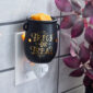 The Cauldron Pluggable Fragrance Warmer is the perfect way to add a spooky yet charming touch to your Halloween decor. With its sleek black cauldron design and 