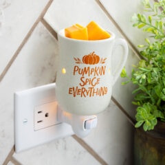 Bring cozy fall vibes to any room with the Pumpkin Spice Pluggable Fragrance Warmer, a cozy fall essential. Styled like a cream colored coffee mug with “Pumpkin Spice Everything