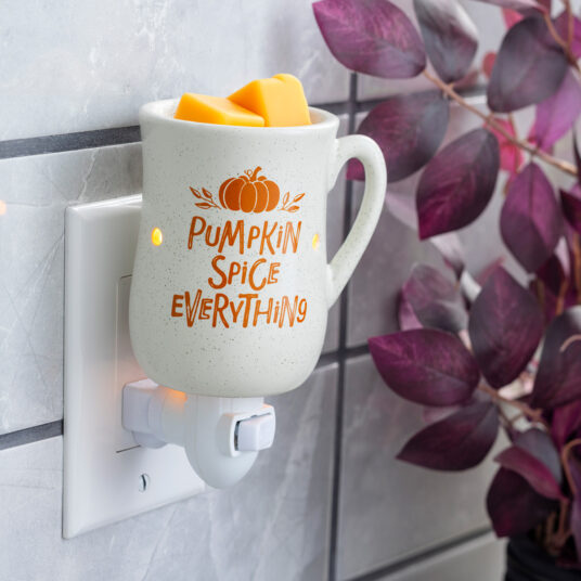Bring cozy fall vibes to any room with the Pumpkin Spice Pluggable Fragrance Warmer, a cozy fall essential. Styled like a cream colored coffee mug with “Pumpkin Spice Everything