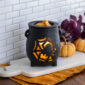The Creepy Cauldron Fragrance Warmer brings a spooky-charming touch to your Halloween décor. The textured black cauldron features a spider and web cutout design that sets an eerie mood while melting your favorite scents. Perfect for filling your home with festive, ghoulish fragrance all season long.