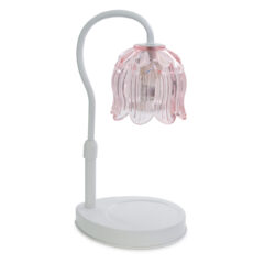 The Tulip Candle Warmer Lamp pairs a soft pink floral-shaped shade with a sleek white base for vintage-inspired elegance.