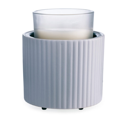The Fluted Crock Candle Warmer’s matte slate-blue glaze and elegant fluted texture bring modern refinement to any space while offering safe, flameless fragrance.