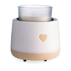 Add handcrafted charm with the I ❤ U Crock Warmer. This crock is covered in a matte white glaze with a heart-shaped detail that reveals natural speckled clay for a tactile, cozy feel.