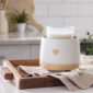Add handcrafted charm with the I ❤ U Crock Warmer. This crock is covered in a matte white glaze with a heart-shaped detail that reveals natural speckled clay for a tactile, cozy feel.