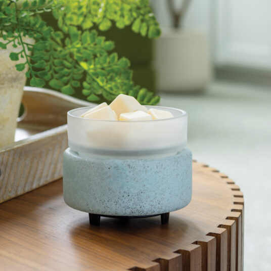 Bring coastal elegance to your space with the Beach Glass 2-in-1 Warmer, showcasing a flecked aqua sea glass base and a removable frosted dish for easy cleaning.