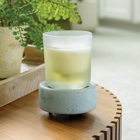 Bring coastal elegance to your space with the Beach Glass 2-in-1 Warmer, showcasing a flecked aqua sea glass base and a removable frosted dish for easy cleaning.