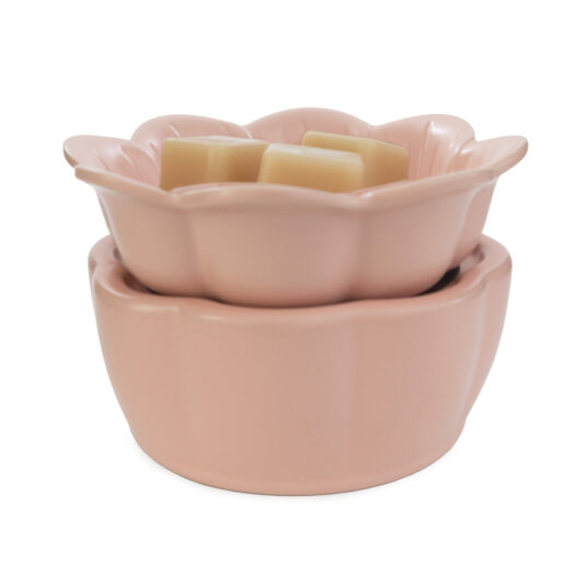 The Petal 2-in-1 Fragrance Warmer features a dish with delicate pink ceramic petals atop a matching pink warming base.