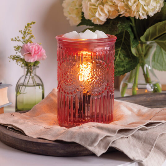 Elevate your home decor with the Pink Parisian Glass Vintage Bulb Fragrance Warmer. This stunning piece combines embossed glass, floral motifs, and delicate beading for romantic, vintage-inspired style.