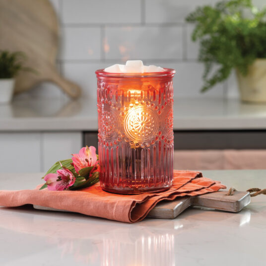 Elevate your home decor with the Pink Parisian Glass Vintage Bulb Fragrance Warmer. This stunning piece combines embossed glass, floral motifs, and delicate beading for romantic, vintage-inspired style.
