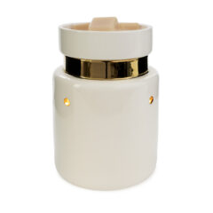 Add a touch of modern glam to your space with the White & Gold Illumination Fragrance Warmer. This sleek ceramic design features a glossy white finish accented by a reflective gold band—perfect for creating a sophisticated statement.