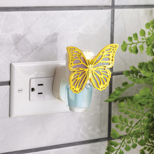 Delicate lavender wings edged in gold give the Butterfly WallScents™ Warmer a whimsical, graceful touch.