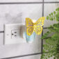 Delicate lavender wings edged in gold give the Butterfly WallScents™ Warmer a whimsical, graceful touch.