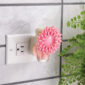 With its vibrant pink petals, the Dahlia WallScents™ Warmer brings a burst of floral charm to any room.