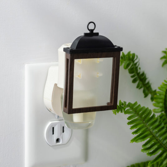 The Lantern WallScents™ Fragrance Warmer brings vintage charm with a compact faux lantern design, gently warming oil for clean long-lasting fragrance.