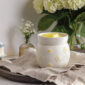 Bring playful, fresh charm to any corner of your home with the Daisy Wax Warmer. Its matte white finish and embossed daisies with sunny yellow centers radiate cheer.