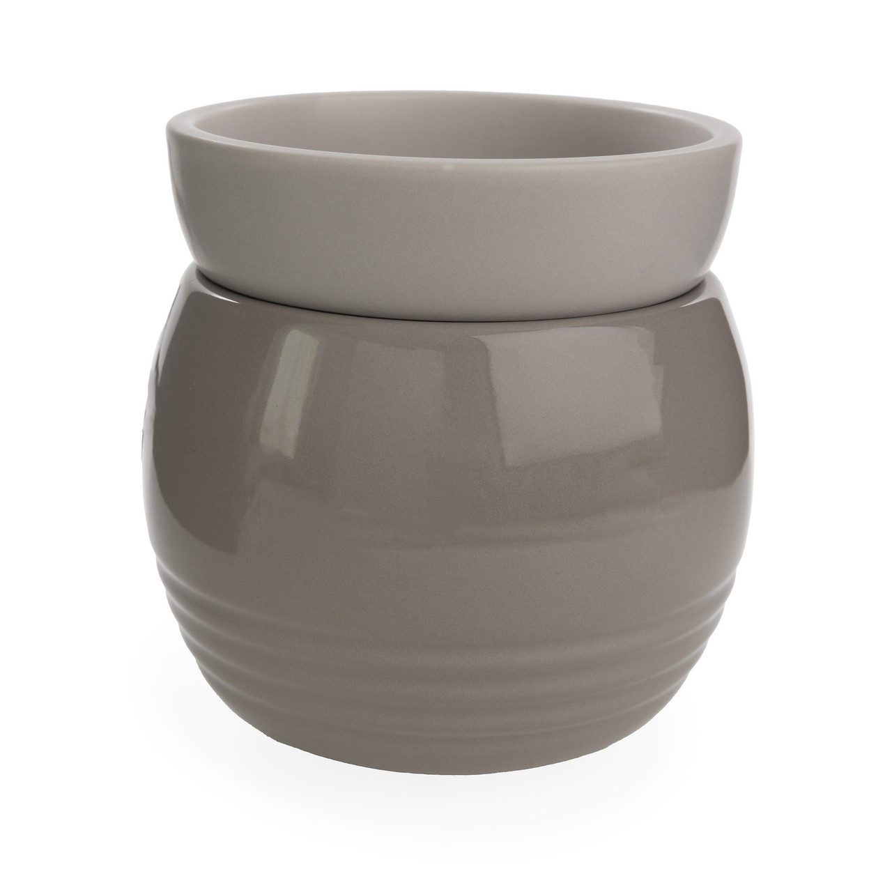 Sleek, rounded, and neutral, the Orb Wax Warmer brings minimalist modern style to desks, counters, and bedside tables with a smooth silhouette and warm finish.