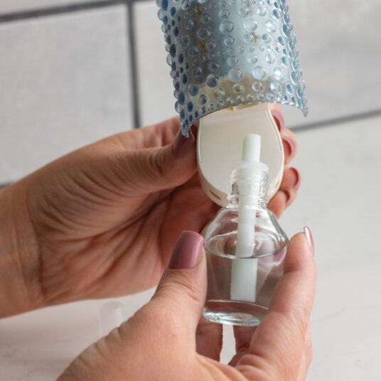 How to use  Mahogany Teak  WallScents™ Fragrance Oil 
STEP 2: Insert wick-first into any WallScents™ Pluggable Warmer