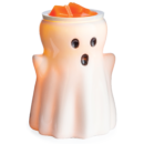 White ceramic ghost-shaped wax warmer holding orange melted wax